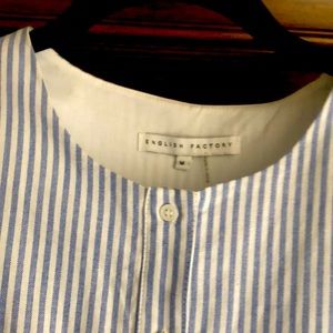 Never worn. Runs a bit small in chest area